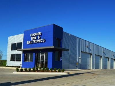 Cooper Tint & Electronics finished metal building exterior.