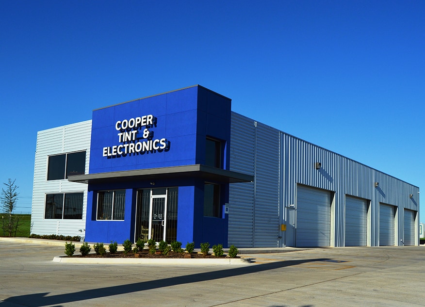Cooper Tint & Electronics finished metal building exterior.